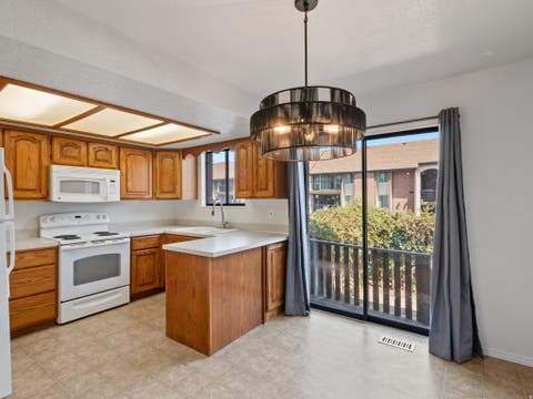 Tiny photo for 1113 COUNTRY HILLS DR #B2, Ogden, UT 84403 (MLS # 2175649)