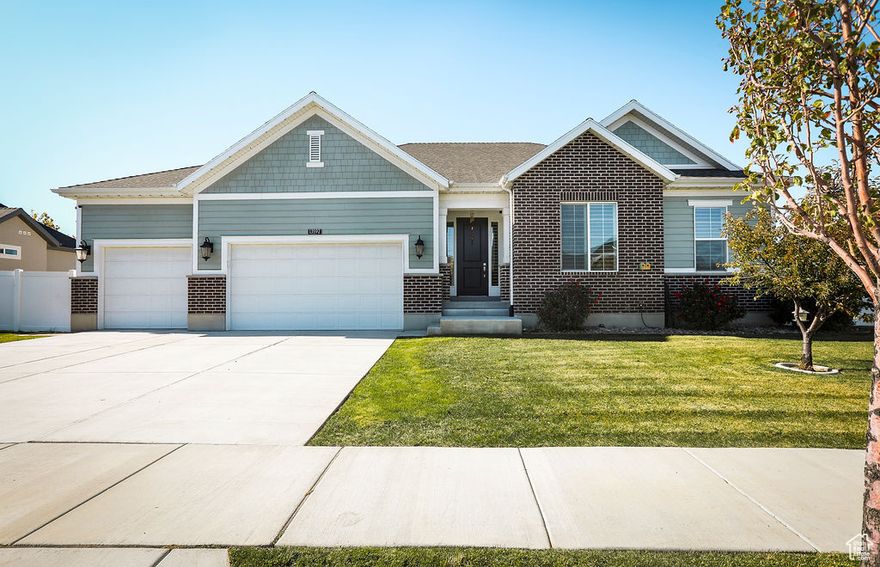 More than just an exceptional residence, this 5-bedroom, 4,142 sq. ft. home is the ideal backdrop for your family's next chapter, perfectly positioned in a quiet, safe Herriman neighborhood. Picture life unfolding within the sunlit, open-concept main floor, where dinner prep turns into family gathering time, and the fully finished basement with 9-foot ceilings becomes the ultimate zone for game nights and childhood adventures. Outside, the beautifully landscaped and fenced 1/3 acre yard offers a secure haven for pets and play, all while you enjoy breathtaking views that make every morning special. From the essential convenience of a 3-car garage and included appliances to the peace of mind provided by the Blink security system, every detail here supports a life of comfort, growth, and endless cherished memories.