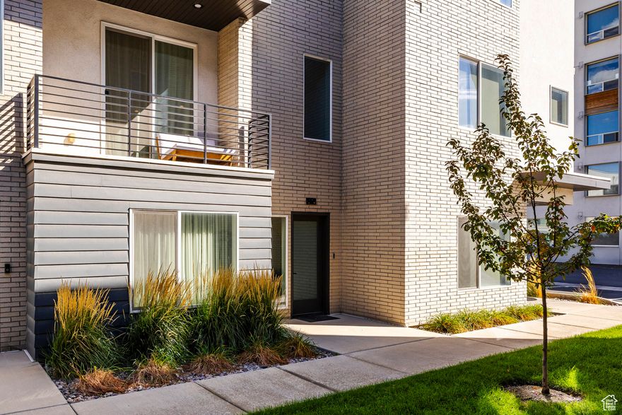 Modern townhome in like-new condition with quartz counters, stainless steel appliances, sleek finishes, and a private two-car garage. Bright open layout and a primary suite with walk-in closet and a spacious bath. Just steps from TRAX, Smith's Ballpark, and local dining. For a limited time, the Sellers are offering a financing incentive, "2-1 buydown" that lowers your interest rate by 2% the first year and 1% the second year. Contact the listing agent for more info.