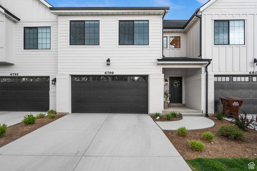 Welcome to your future home at our stunning, fully furnished modern farmhouse townhome! This exquisite abode boasts a perfect blend of contemporary elegance and cozy charm, offering you the ultimate in comfort and style.  As you step inside, you'll be greeted by the impeccable design featuring 5 CM quartz countertops complemented by bright white cabinets, tiled baths, and commercial-grade laminate flooring. The upgraded plush carpet with memory foam pad adds an extra touch of luxury underfoot. Marvel at the modern black and gold fixtures, vaulted ceilings, and large windows that flood the space with natural light, creating a warm and inviting ambiance throughout.  The main floor welcomes you with its 9' ceilings and opens up to a covered patio, perfect for enjoying your morning coffee or hosting intimate gatherings. The grand master bedroom awaits upstairs, complete with an ensuite bath boasting double sinks, a separate tub and shower, and a spacious walk-in closet for all your storage needs.  Your culinary adventures will thrive in the well-appointed kitchen, equipped with brand new stainless appliances, including a french door refrigerator, and a water softener for added convenience. And with a washer/dryer included, laundry day becomes a breeze.  For eco-conscious residents, there's a 240 outlet in the garage for your electrical vehicle needs, ensuring you're always charged up and ready to go. Plus, with fully furnished accommodations down to the last dish and towel, all you need to bring is yourself and your personal belongings.  However, it's not all leisure here. As part of the rental agreement, renters are responsible for snow removal and maintaining an active renter's insurance policy. Additionally, utilities are to be covered by the renter.  For pet lovers, rejoice! One small dog up to 25 lbs is allowed with a $250 nonrefundable pet fee. And for those who need a dedicated workspace, one of the rooms doubles as an in-home office (not shown in the images).  Don't miss out on the opportunity to make this your home sweet home. With flexible lease options ranging from 3 to 24 months, there's a plan to suit every lifestyle. The price listed is for a 12-month lease term, so act fast before this gem is gone!