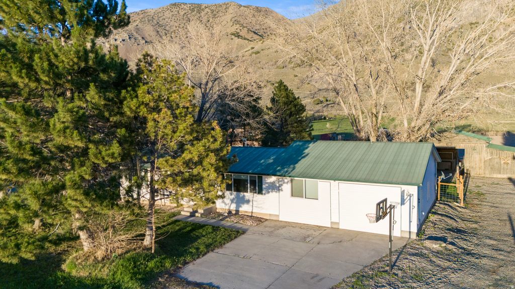 Photo of 10390 N HIGHWAY 38, Deweyville, UT 84309 (MLS # 2146390)
