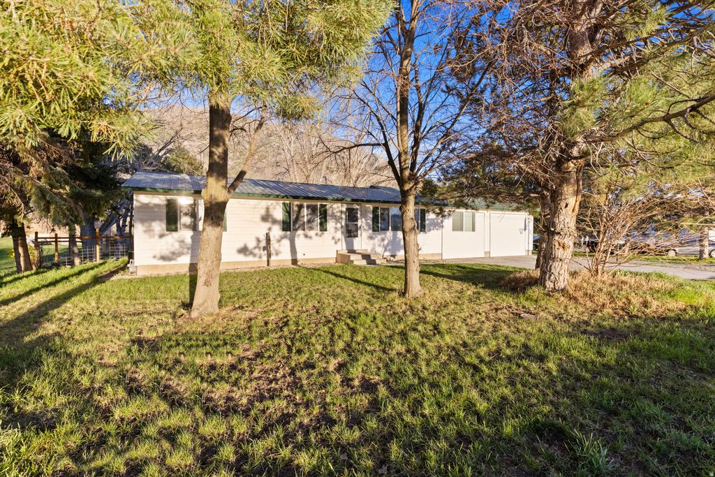 Photo of 10390 N HIGHWAY 38, Deweyville, UT 84309 (MLS # 2146390)