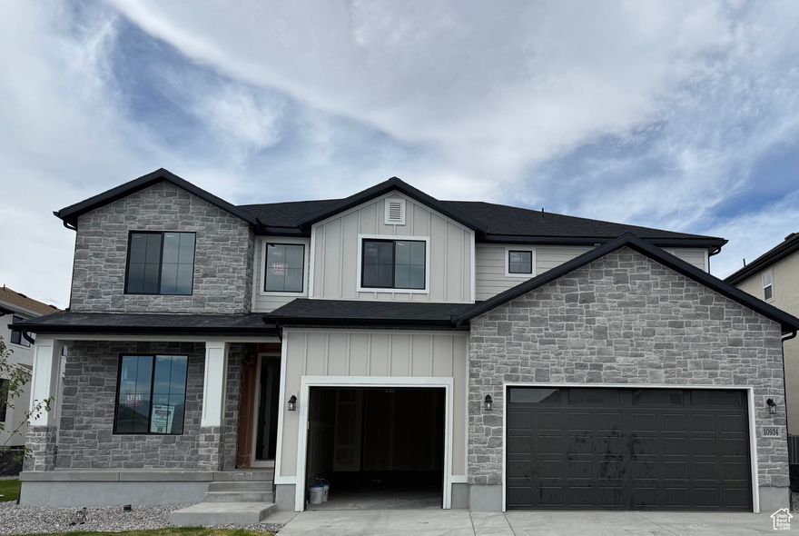 The Witzel Floorplan with a two-story vault living room and entry this home is an open and spacious concept. Large designer kitchen with custom pulls, plumbing, and stainless steel appliances. Laminate hardwood, upgraded carpet, designer wall finishes.