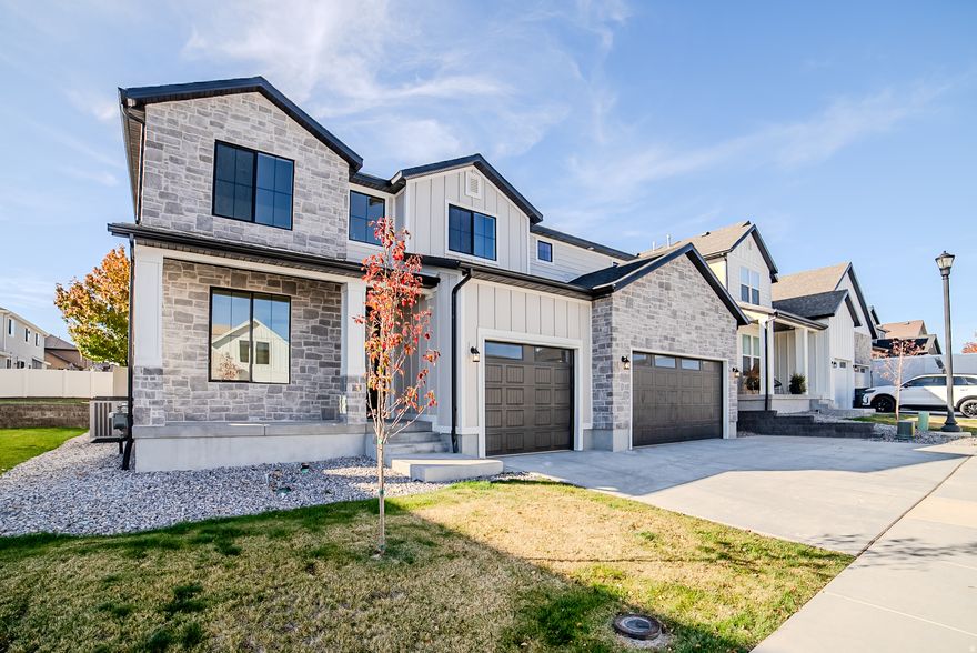 The Witzel Floorplan with a two-story vault living room and entry this home is an open and spacious concept. Large designer kitchen with custom pulls, plumbing, and stainless steel appliances. Laminate hardwood, upgraded carpet, designer wall finishes.