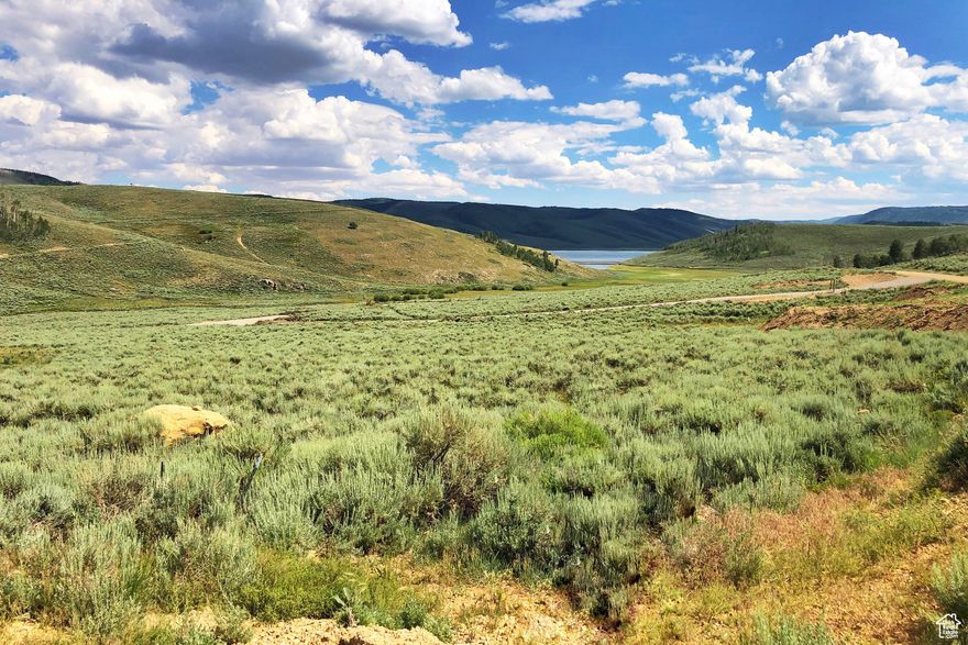 Amazing views of the lake and mountains! This gradually sloped lot in the Scofield Mountain Estates development is perfect for building your dream home or a cabin for a weekend getaway. With views of the Scofield Reservoir, this lot is truly one of the premier lots in the development. Fly fishing and lake fishing are within walking distance. There are also a number of ATV trails leading all the way to Skyline Ridge. If boating is on the top of your list, Scofield Reservoir has two boat ramps to launch, making water access incredibly easy. The common area with Scofield Mountain Estates provides tennis courts, a volleyball court, pickleball, a basketball court, and a covered pavilion with BBQs for your private use, all within walking distance from the lot. Water, power, and network stubbed to the property. The lot has already been partially de-grubbed with two access drives and a level area to park an RV. Less than 2 hours from the Salt Lake Valley, and year-round access, this lot has it all.