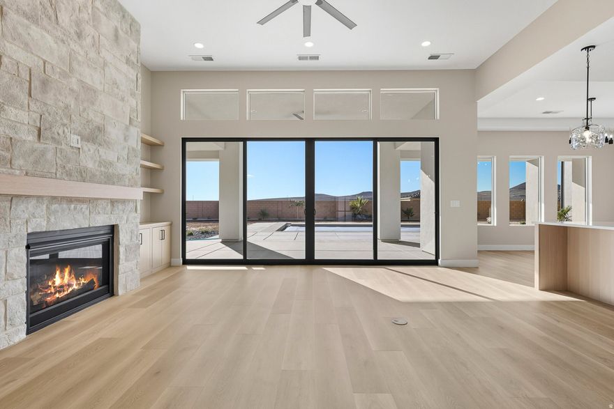 Designed with both purpose and polish in mind, this home offers a very rare blend of flexibility and thoughtful design. The oversized 55' x 18' RV garage features 14' tall doors & plenty of room for recreational vehicles, toys, & gear, plus a bonus loft space that can adapt as a workout area, lounge, pool room, or additional storage. Tucked behind the RV garage, the detached casita adds another layer of functionality-ideal for visitors, income producing rental, or independent living space. Throughout the home, you'll find carefully selected finishes & quality craftsmanship that elevate every room. Conveniently located just 5 minutes from SR-7, 7 minutes from Lin's Grocery Store, and under 15 minutes to Sand Hollow, this property offers easy access without sacrificing a sense of calm Description: Designed with purpose and polish in mind, this home offers a rare blend of flexibility and thoughtful design. The centerpiece is an oversized 55' x 18' RV garage with 14' tall doors, giving you ample space for recreational vehicles, toys, and gear, plus a bonus loft that can adapt as a workout area, lounge, pool room, or extra storage. Tucked behind the RV garage, a detached casita adds another layer of functionality-ideal for visitors, a rental, or independent living space. Throughout the home, carefully selected finishes and quality craftsmanship elevate every room, creating spaces that feel both luxurious and livable. Enjoy easy access without sacrificing a sense of calm. Location highlights: - Just 5 minutes from SR-7 for quick commuting - Only 7 minutes from Lin's Grocery Store for everyday convenience - Under 15 minutes to Sand Hollow, offering recreational options while keeping a peaceful, residential atmosphere Why you'll love it: - A highly flexible layout that adapts to your lifestyle, from RV enthusiasts to multigenerational living - A private casita that expands your hosting and income possibilities - Thoughtful finishes and craftsmanship that elevate daily living Schedule your tour today to experience this rare combination of practical space and refined detail.