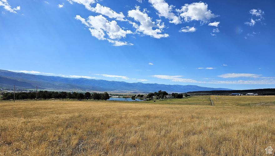 Views, no HOA, private land, power, water and all usable acreage! Get away from it all and enjoy country living on 6.5 acres in the Sanpete Valley, just north of Fairview City with breathtaking views of the Manti La-Sal mountains and the Sanpete Valley. Build your dream home and escape the traffic and noise and have lots of room to spread out. Less than 45 minutes Utah Valley and Costco. NO HOA! Fresh clean air and gorgeous star-filled night skies for you to enjoy. Year round access on a maintained and snowplowed county road. Power is available through Fairview City. Sewer would be a septic system. Water is connected and provided by a shared private well in which you will own your own water. Easy access to Fairview Canyon and the National Forest and the 360-mile Skyline Drive trail system for all the fun Mother Nature has to offer. Enjoy all of the small-town amenities within 10 minutes of this property like a hospital, grocery and hardware store, indoor swimming pool and even a drive-in theater. MLS map is correct and Google Maps/Earth are 39.65072, -111.46019. Buyer to verify all information.