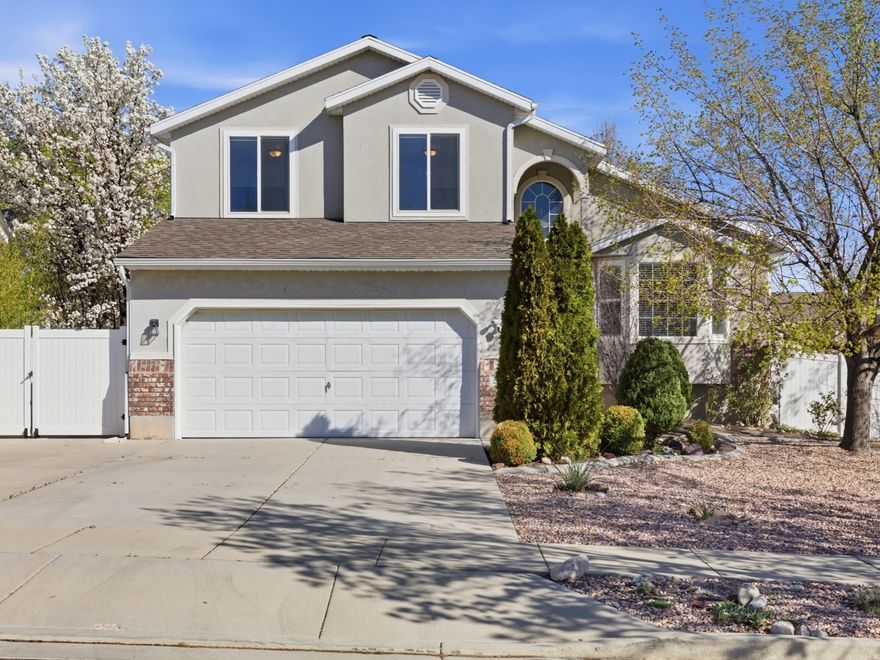 **NO SHOWINGS UNTIL GRAND OPEN HOUSE ON SATURDAY, MARCH 28TH, FROM 11:00 AM TO 1:00 PM**  Smile...You're Home! This beautiful tri-level home shows pride of ownership. It is located in a desirable West Jordan Suncrest Ridge neighborhood where homes are rarely available, and neighbors tend to stay for years. Buyers can move in with confidence thanks to numerous updates, including a new roof (2021), water heater (2021), expansion tank (2025), furnace/AC with humidifier and Halo Black UV Light Air Purifier, new hardwired smoke and carbon monoxide detectors, new windows in bedrooms and living room (2021), new front door (2023), hookups for water softener and filtration system, and newer appliances that stay with the home. The Ring doorbell, Ring camera floodlight, and smart thermostat are included. All these updates make this home truly move-in ready.  Located close to schools, shopping, and coffee shops, with the Mountain View Corridor just minutes away. Offering 3 bedrooms, including a spacious primary suite with an en-suite bath, standing shower, and walk-in closet, plus a fully finished basement with potential for a 4th bedroom, a flexible office space, or a gym. Updated kitchen with granite countertops and a walk-in pantry. With vaulted ceilings and an open, spacious layout, this home provides both comfort and versatility for everyday living.  Enjoy outdoor living in the fully fenced backyard with a stamped concrete patio, ideal for relaxing or entertaining. Additional features include RV parking, a 2-car garage, a storage shed, and a low-maintenance xeriscaped front yard.  Square footage figures are provided as a courtesy estimate only. Buyer is advised to obtain an independent measurement.