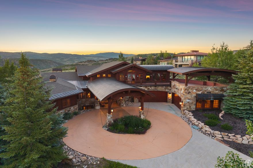 Mountain Living at Its Finest -- Discover this stunning mountain retreat in the exclusive Promontory Club, Park City's most desirable private community. Nestled on an exceptionally spacious 2.91-acre estate within the prestigious West Hills neighborhood, this home offers the perfect blend of luxury, privacy, and mountain living. Designed in a true mountain traditional style, it exudes timeless charm with exceptional build quality and thoughtful craftsmanship throughout. The residence boasts over 8,500 square feet of living space, including 6 bedrooms, a state-of-the-art home theater, and exceptional entertaining areas. Featuring some of the most stunning architecture, this home is a masterpiece in its own right, while offering breathtaking views that enhance every moment spent here. Step outside to a massive wraparound patio on the main level, ideal for gatherings under the mountain sky. An elevated second-story deck provides sweeping views of the iconic Wasatch Mountain Range-perfect for soaking in mountain vistas and hosting unforgettable moments.  The home features a spacious 7-car garage, ensuring plenty of space for vehicles and gear, and offers direct access to all the amenities of Promontory, including world-class golf and skiing just steps away. Offered fully furnished with negotiable artwork, this is a true legacy property in one of the most coveted communities in Park City.
