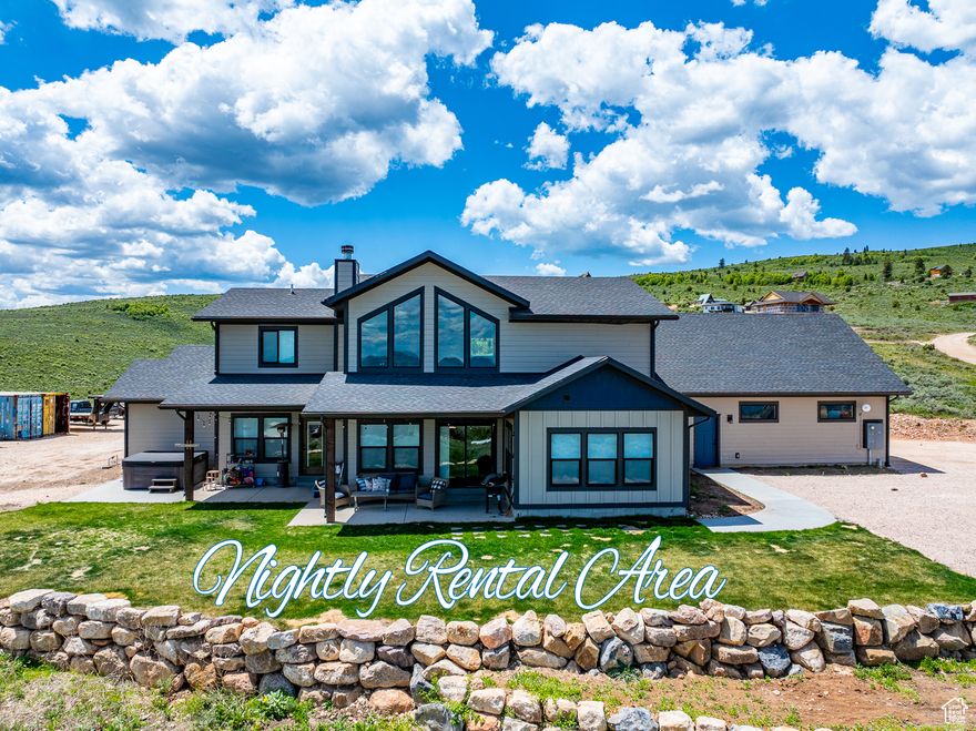 Custom built home on 2.44 acres in beautiful Bear Lake!  Located in Sweetwater with views of Bear Lake and the mountains!  Home is situated to maximize parking and for future expansion.  The pad is  ready to build a future shop up to 60 x 80', with a 400 amp meter installed to support it.  Water and power are also  plumbed to the pad!  RV pad with infrastructure is in place for 2 RV hookups.  Wireless sprinkler system installed with 2 zones, each with 4 valves for easy expansion.  The garden area features an antifreeze faucet and water source close to the fire pit area adding convenience for outdoor activities.  The home features, LVP flooring, granite countertops, rock fireplace, vaulted ceilings, covered porch, hot tub and much more!  Short term rentals are currently not restricted!  Buy today and start enjoying all Bear Lake has to offer, whether vacation, year round or rental!  Amenities available through HOA for an additional fee include: Beach access, swimming pools, mini golf, tennis, large common areas.