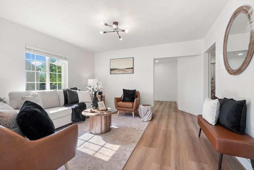 This beautifully updated home offers more space than meets the eye with 2,860 sq ft, 5 bedrooms, and 3 bathrooms. The main level features a private primary suite complete with its own bathroom, along with a warm and inviting living area and an oversized family room highlighted by a stylish new electric fireplace. Downstairs, you'll find a fully equipped 2-bedroom, 1-bath mother-in-law apartment with a separate entrance-perfect for guests, rental potential, or multi-generational living. Nearly every detail has been refreshed, including brand-new kitchen cabinetry, fixtures, hardware, plumbing, electrical, windows, tile, vanities, tubs, toilets, and more. All information deemed accurate. Buyer to verify all.