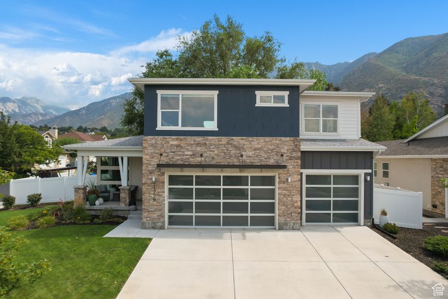 Tucked away in the coveted hills of East Sandy, this architectural gem offers a rare blend of sophistication and serenity. Built in 2020 and thoughtfully designed with a flowing, open floor plan, the home captures both elegance and ease of living. Adjacent to the prestigious Hidden Valley Country Club, residents enjoy unmatched access to world-class recreation and stunning mountain backdrops. Energy-efficient features elevate comfort and convenience, while the shaded backyard creates a private, tranquil retreat for outdoor dining and entertaining. Every detail of this residence reflects modern luxury in one of Sandy's most desirable settings.  Make it yours today.
