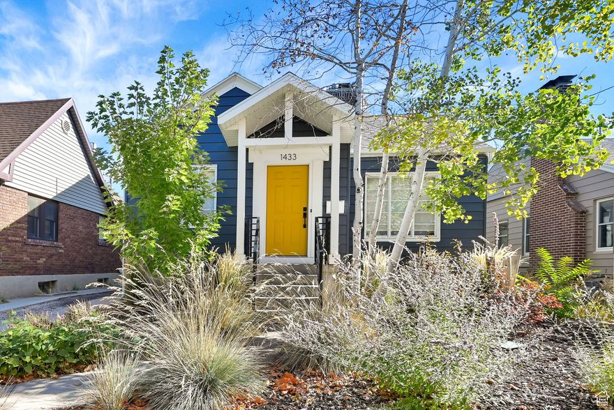 Fresh, modern, and beautifully updated, this home offers a bright and airy feel throughout. The main level features gorgeous wood floors, a welcoming formal entry, and a stylish kitchen complete with quartz countertops and stainless steel appliances. Enjoy meals in the semi-formal dining room, perfect for everyday living or entertaining. The main floor includes two comfortable bedrooms and a fully updated bathroom with a walk-in shower. Downstairs, the finished basement provides two additional bedrooms, updated full bath,  and a spacious family room, ideal for movie nights, games, or relaxing with family and friends. Outside, the home offers great curb appeal with a low-maintenance xeriscaped front yard. The backyard is perfect for entertaining, featuring a deck, grassy area, and mature trees that provide shade and privacy. This home combines modern updates, functional living space, and inviting outdoor areas. Stone's throw from 15th & 15th, Caputos, Cassot, Mazza, Kings English, Tulie Bakery, Emigration Market, Nomad East, Emigration Cafe, close to the University of Utah, and 30 minutes from the ski resorts -a wonderful place to call home.