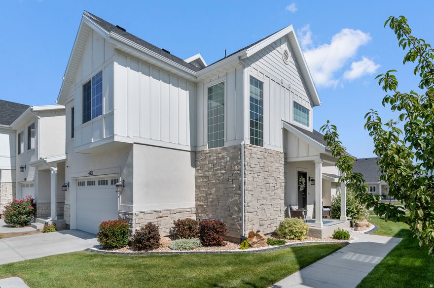 Stunning townhome in Villages on 27th, built by Brad Reynolds. Bright, open-concept with vaulted ceilings, large windows and LVP flooring throughout. Oversized owner's suite with dual sinks, tub and walk-in shower. Finished basement with second living space, wet bar, half bath and storage--perfect for entertaining. Upgrades include epoxy garage floors, open shelving, fenced patio and Vivint security. Prime location with easy access to downtown and airport. Square footage figures are provided as a courtesy estimate only and were obtained from county records. Buyer to verify all.