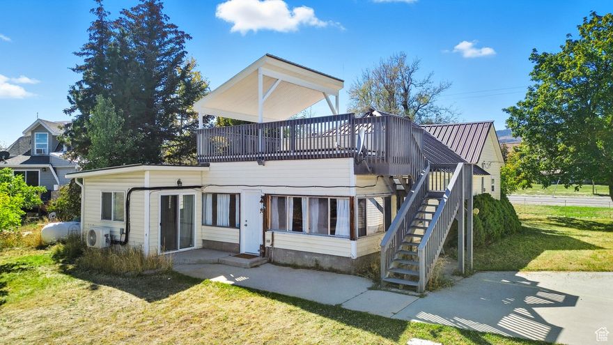 Rare Opportunity in Bear Lake! Your dream property has just come on the market-homes like this don't come around often! Nestled on nearly a half-acre with no HOA, this charming property offers both residential and commercial zoning, giving you endless possibilities. Located within walking distance to beautiful Bear Lake and right across the street from downtown Garden City's restaurants and shops, the oversized lot is perfect for entertaining family and friends, with ample room for RVs, boats, jet skis, and all your toys-with convenient year-round access. The home has seen some recent updates, comes mostly furnished (see inclusions list), and is truly turn-key-making it ideal as a primary residence, vacation home, short-term rental, or even a new business venture. Highlights include fruit trees, mature landscaping, a spacious open deck for summer BBQs and gatherings, and a desirable corner lot with lake views. Don't miss this chance to own your own slice of heaven in Bear Lake!