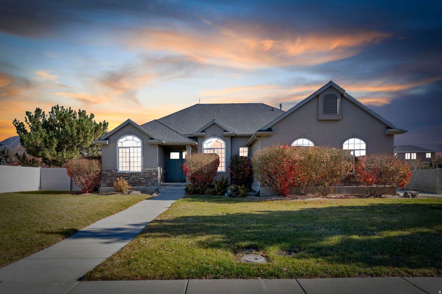 Hello Lehi, this is your house! Updated kitchen with an island to die for, so much light you'll need sunglasses inside, basement entrance, RV parking, huge yard perfect for an awesome playset, get out and come see this house! Square footage figures are provided as a courtesy estimate only and were obtained from county records .  Buyer is advised to obtain an independent measurement.