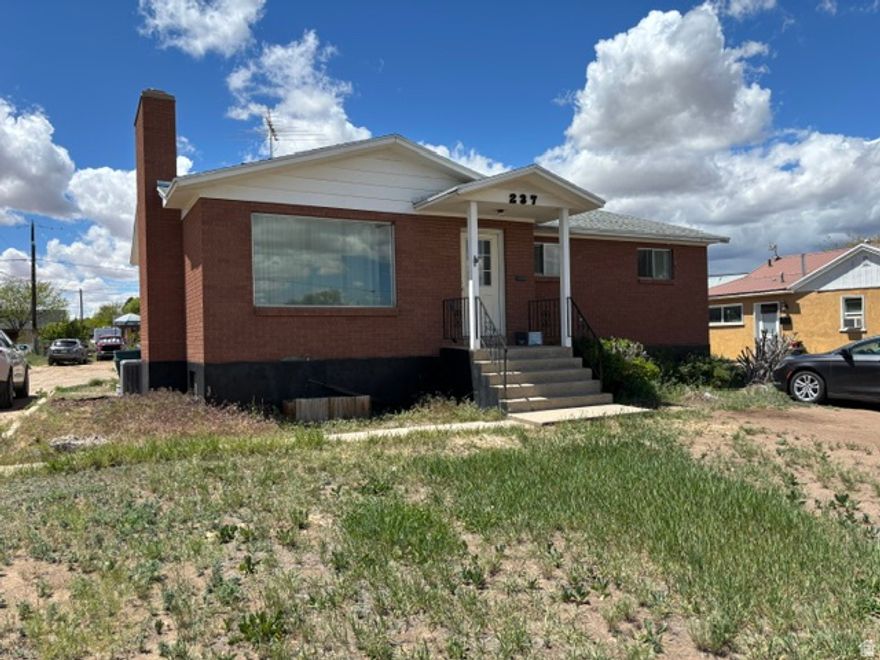Sturdy brick rambler centrally located with large lot.  Separate entrance to the basement through the garage, that could be used as a rental.  Prime location for a rental property.