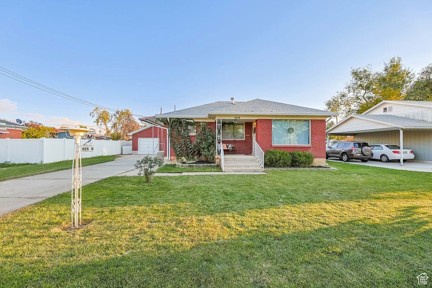 Don't miss this charming, well-maintained brick bungalow located in a prime neighborhood, close to excellent schools, parks, and shopping. Step inside to a spacious living room with beautiful hardwood floors and large windows, leading to an updated kitchen featuring white cabinets, granite countertops, and stainless steel appliances (fridge stays!). The main floor offers 2 bedrooms and a full bath. Downstairs, find a large family room, 2 additional bedrooms, and a 3/4 bath. The fully fenced, private yard is perfect for entertaining with a covered patio, fire pit, and garden boxes. Enjoy the convenience of an oversized detached garage, peace of mind with a NEW FURNACE and AC and LED holiday lighting! This home truly won't disappoint.
