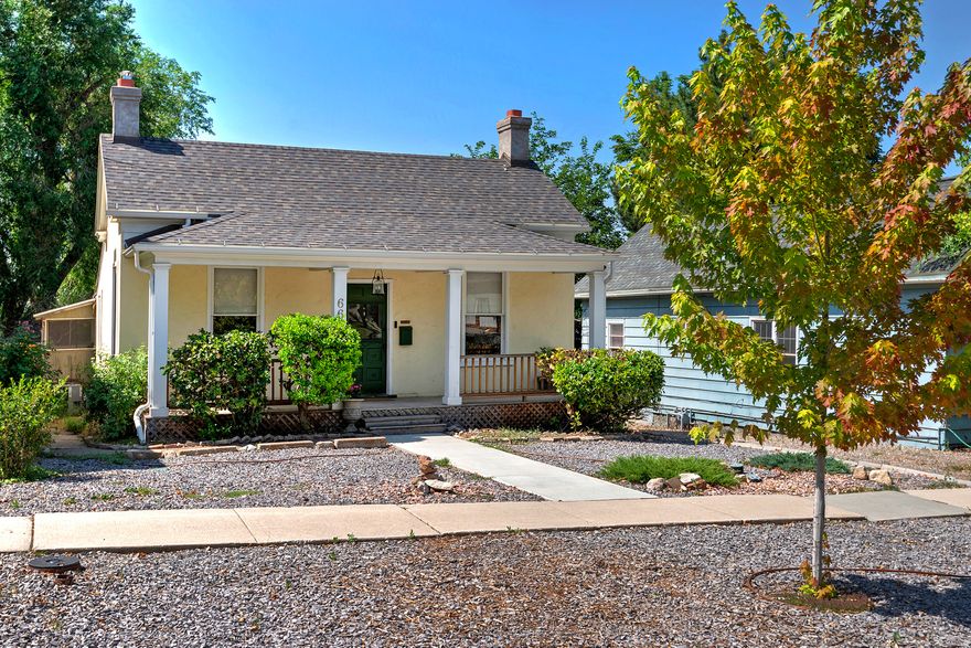 This charming single-story Salt Box-style cottage sits on a quiet street in the heart of Salt Lake City's Avenues Historic District. Thoughtfully and fully renovated, the home is completely move-in ready. The dine-in kitchen has been updated with quartz countertops, stainless steel appliances, a gas range, and new window coverings throughout. Bathrooms are newly remodeled with porcelain tile floors and a luxurious walk-in shower. A new water heater has been installed, along with energy-efficient double-hung windows and updated electrical, plumbing, and HVAC systems. Original character has been preserved with wide- plank pine hardwood floors and baseboards in the front living room and bedroom. Additional highlights include hardwood flooring, a stacked high-efficiency washer/dryer, and a wood-burning stove in the living room that adds cozy ambiance on winter nights. Large windows throughout provide an abundance of natural light. The three bedrooms feature spacious closets, some with lighting for added convenience. Outside, both the front and back yards have been recently landscaped. Enjoy the shaded front porch or relax around the backyard fire pit. Newly installed pavers create an inviting seating area in the backyard-perfect for outdoor gatherings. A private driveway offers generous off-street parking and space in the back for a potential garage, while preserving a large backyard. The home is ideally located with easy access to Downtown and the University of Utah. Nearby are local favorites like coffee shops, restaurants, grocery stores, parks, and protected trails-all within walking or biking distance. The renovation was fully permitted and meets the historic preservation standards of the Utah State Office of Historic Preservation and the U.S. Department of the Interior. Additional upgrades include a newer roof, new sewer line (by previous owner), and recent foundation stabilization with four steel support beams and posts.
