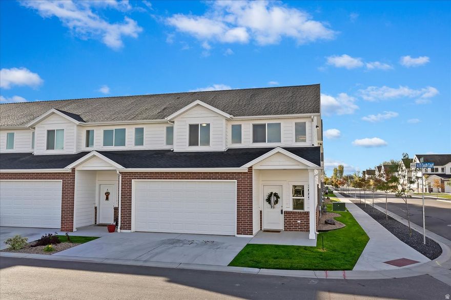 All appliances you see in model home are included, including the refrigerator. Builder will provide a 1 year home warranty. This beautiful, brand middle unit is fully upgraded and move In ready. The layout of these units are awesome! They are very open and spacious and the layout and design have been very thought through. Some of the great features include an oversized master bedroom with walk-in closet, both full bathrooms have a large vanity with double sinks, and an open and spacious dining room, living room and kitchen with a walk-in pantry. There is a playground, basketball and pickleball court, and grass area for pets. Photos are of model home, but the unit available will be the same interior. This community is a short distance from a freeway onramp. School boundaries recently changed. The new schools are: Elementary-West Weber, Jr High- Mountain View, and High school- West Field high