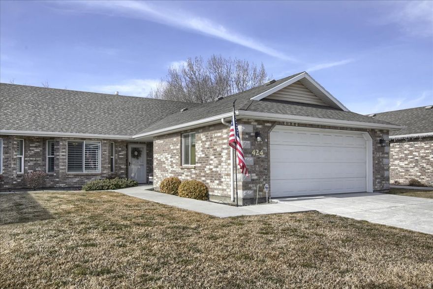 Come tour this beautiful American Fork twin home in a peaceful 55+ community.  Offering the best of main floor living with no step entries from the spacious two-car garage (with work bench). and front door.  You'll love the open kitchen/great room floor plan offering three bedrooms and two bathrooms with easy access to the laundry. The kitchen offers granite countertops and lovely wood cabinetry with floor-to-ceiling storage and convenient desk unit. The vaulted great room has ample room for visitors and provides direct access to the covered patio and fenced yard, perfect for year-round relaxing. The primary suite boasts a spacious vanity, storage, walk-in shower and a walk-in closet.  Enjoy peaceful walking trails and numerous community amenities, including a varied calendar of events, clubhouse, large gathering room, kitchen, ping pong, gym, pool, hot tub, library and even a reasonably-priced hair salon/barber. The location is ideal with easy access to medical care, dining, shopping and free-way entrance. Schedule your personal tour of this lovely home today. *Measurements taken from County records; buyer advised to verify.