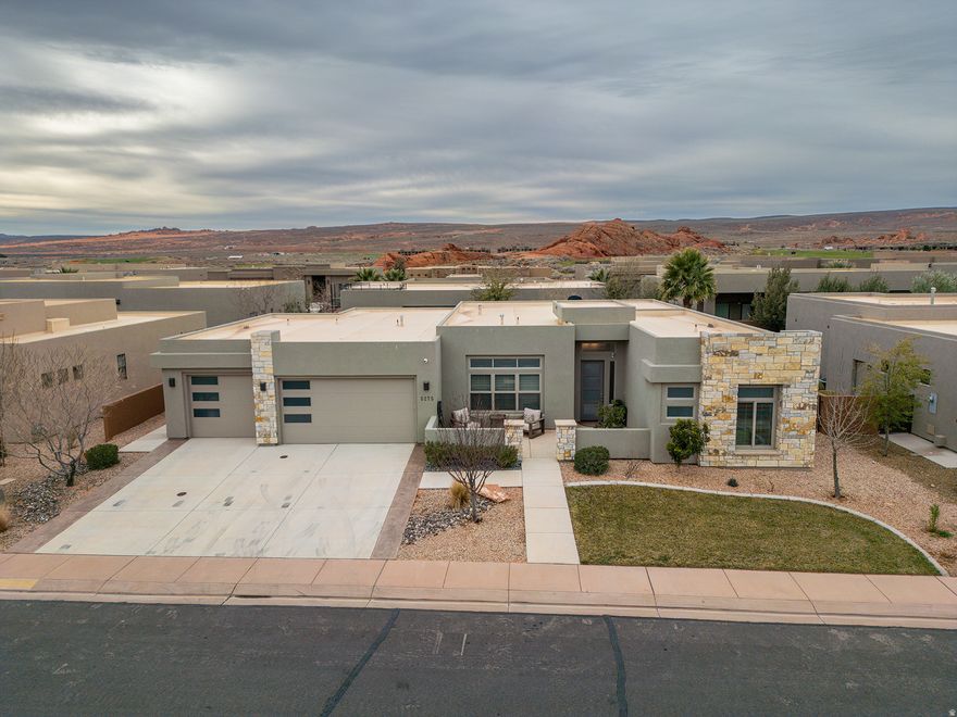If you're searching for your forever home or the perfect second-home retreat, nestled in the stunning golf community of Sand Hollow, you've just found it - and it comes fully furnished, making it completely move-in ready. This beautifully designed 4-bedroom, 3-bath home is truly a must-see. From the moment you step through the front door, you'll be welcomed by an open-concept layout that blends comfort and style. The spacious kitchen flows seamlessly into the expansive living room, creating the ideal setting for everyday living and entertaining. The oversized island offers plenty of seating and prep space-perfect for gathering with friends and family while you cook and connect. When it's time to dine or unwind, step outside to the covered patio and enjoy the open space and peaceful surroundings that make this golf community so special. The primary suite is impressively sized, offering room for a king-size bed plus a sitting area-your own private retreat to relax and watch TV. The luxurious en-suite bathroom features dual sinks, a large walk-in closet, and a spacious walk-in shower. Three additional generously sized bedrooms provide comfort and flexibility for guests, family, or a home office. The oversized 3-car garage ensures you'll have plenty of room for vehicles, golf carts, and all your recreational toys. Living here means enjoying resort-style amenities, including pools, hot tubs, pickleball courts, and beautifully maintained common green space. And of course, you're just moments away from the award-winning Sand Hollow Golf Course-widely recognized as one of the best courses in the region. Fully furnished, beautifully maintained, and located in one of Southern Utah's premier golf communities-this is effortless resort-style living at its finest. Schedule your private showing today. All information is deemed reliable but is not guaranteed and should be independently verified.