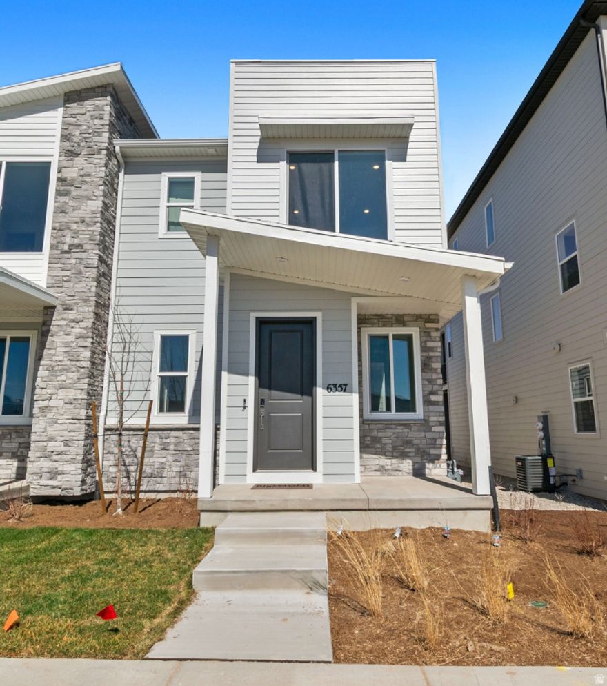 MOVE IN READY HOME***The Chicago plan greets guests with a charming, covered porch and continues to impress with an open kitchen featuring a pantry, center island and adjacent dining room. The main floor also offers a powder room, an inviting living room, a covered patio with center-meet sliding glass doors, and a 2-car garage. Upstairs enjoy 9ft ceilings & 8ft doors you'll find 8ft doors, a convenient laundry and three generous bedrooms, including a lavish master suite with an immense walk-in closet and private bath with double sinks. Designer curated finishes complete this semi-luxury home with quartz countertops throughout home and lvp flooring on main areas. Minutes away from shopping, food, entertainment, schools. Buyer to verify square footage. Come and visit today.