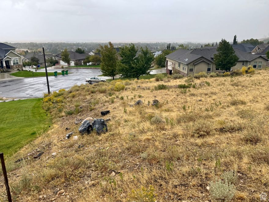 Enjoy breathtaking views from this east bench cul-de-sac lot! A rare opportunity-mostly flat, fully improved, and ready to build in an established neighborhood. With no backyard neighbors, your only backdrop is the mountain, offering privacy and peace. Bring your own builder and create the home you've been dreaming of. Conveniently located with quick access to I-15, Sardine Canyon, and Cache Valley, all while being tucked into the quiet Brigham City foothills.