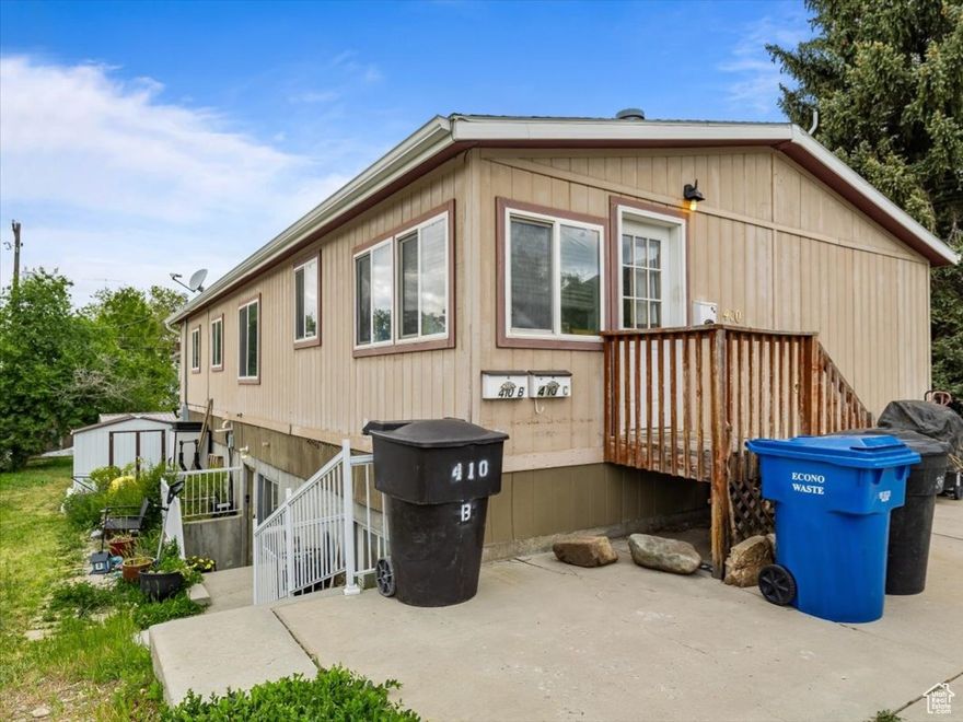 REDUCED PRICE!!!   Welcome to this fantastic home located in the heart of Brigham City. Built in 1999, this well-maintained property offers a unique investment opportunity or a comfortable living arrangement for multi-generational families. Main Level - Spacious living area with ample natural light. Open kitchen, 3 bedrooms, 2 full bathrooms, washer and dryer hookups, private entrance, and access to a shared backyard. There is also a den that could be used as a bedroom with an added wardrobe closet. Basement -  Cozy living room perfect for relaxing. Well-equipped kitchen with plenty of storage, 2 bedrooms with large windows, and 1 full bathroom, washer and dryer hookups, private entrance, and access to a shared backyard. An additional feature of the basement is a separate Mother-in-law studio apartment with a 3/4 bath, kitchen, and private entrance. The generous lot provides ample space and has multiple sheds to use as additional storage space. Off-street parking and it is in a quiet, family-friendly neighborhood with easy access to local amenities, schools, parks, and shopping centers. Ideal for buyers who might be interested in renting out the basement to help with their monthly mortgage payment. Don't miss this incredible opportunity to own a well-kept home in Brigham City. Whether you're looking for a solid investment or a new place to call home, this property is sure to meet your needs. SHOWINGS REQUIRE AT LEAST 24 HOURS NOTICE. HOME IS OCCUPIED.