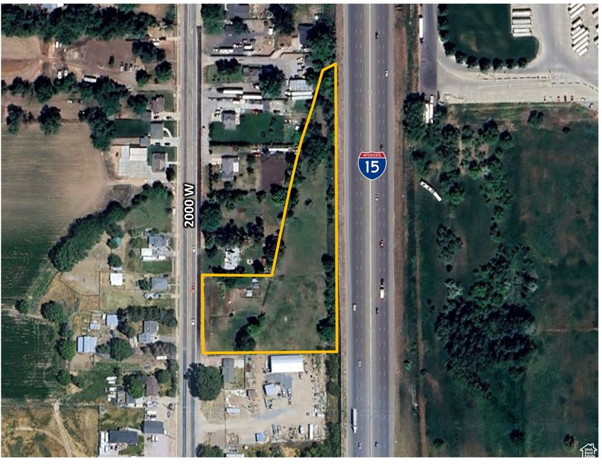This property is conveniently located minutes from I-15 NB and SB. Featuring 226 feet of frontage along 2000 W. Ideal property for flex space, mixed-use, retail, or office. Sewer, power, gas, and culinary water are all available. Property is vacant land and sold in the 'as-is' condition. Personal property, tools, and equipment to be removed by the Seller.