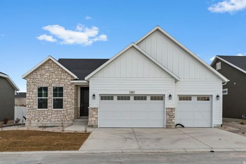 Photo of 692 W JUNEGRASS LN, Stansbury Park, UT 84074 (MLS # 2120966)