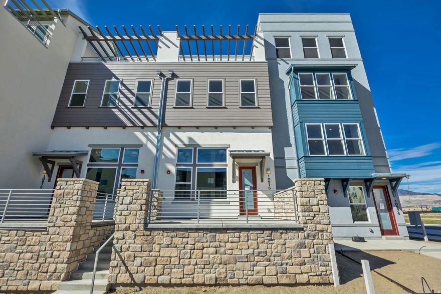 Grand Slam! Stunning new construction 4-story townhome with a private rooftop deck featuring breathtaking east-facing mountain views and hot tub readiness. This thoughtfully designed home offers a spacious, open layout with soaring vaulted ceilings, a gourmet kitchen with Summit cabinetry to the ceiling and a beautiful kitchen backsplash, upgraded lighting and fixtures, and a striking 50" monolith electric fireplace in the living room. The fourth-floor skyroom is an entertainer's dream with a built-in wet bar and direct access to the rooftop deck. Located in the heart of Downtown Daybreak, this home offers modern living with walkable convenience. Offered with a $15,000 preferred lender incentive.