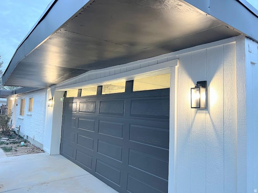 Has Remodeled 3 Beds & 2 Baths plus a Mother in Law Apartment with it's own laundry. Large 4 Car Garage attached. New Kitchens, New Carpet & Paint. HUGE RV Parking & Trailer Storage. Custom Tile Tub Surrounds. Brand New Stainless Steel Appliances. Double Sink Master Vanity & Master Walk In Closet. New LVP Hardwood Flooring. Large Shed or Workshop in back with power. New Central Air, High Efficient Furnace & New Water Heater. New Membrane Roof. New Doors Base & Hardware. No back neighbors as it backs the Elementary School. New Led Lighting & Updated Cans. Updated Electrical Panel. Owner Agent