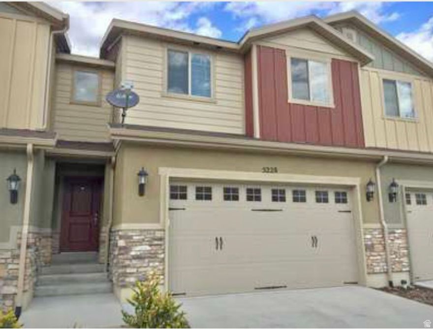 Spacious south facing Herriman townhome located in Rosecrest Village. Recently updated with fresh paint throughout the home, brand new carpet and new kitchen appliances. Large primary bedroom with large walk-in closet. Finished basement with full bathroom, could be used as 4th bedroom or as an additional family room- has own entrance. The community has a clubhouse, fitness center, outdoor swimming pool and jacuzzi. This neighborhood is also conveniently located near the mountain view shopping center, restaurants, grocery store, entertainment areas including a theater, retail shopping and several schools nearby. Square footage figures are provided as a courtesy estimate only and were obtained from county records . Buyer is advised to obtain an independent measurement & to verify all information.