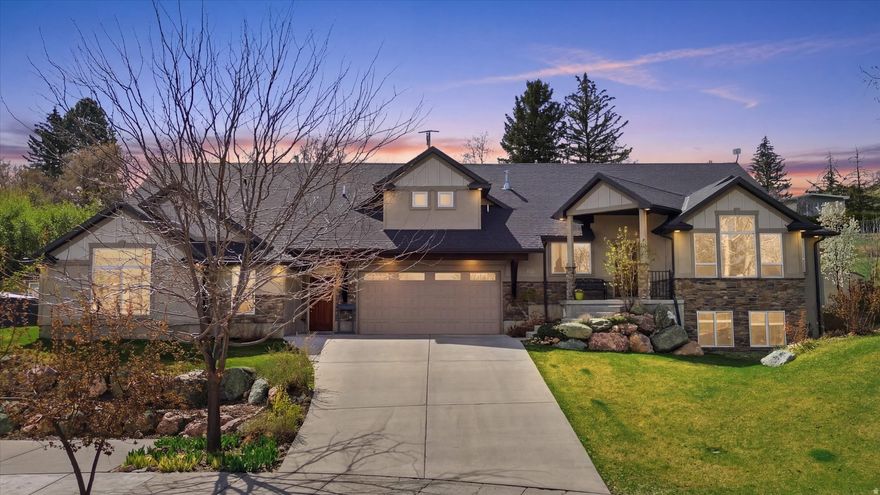 Tucked against the breathtaking backdrop of Sardine Canyon, this exceptional custom estate in Wellsville redefines modern mountain luxury. Set on nearly half an acre, this 5,374 sq ft residence offers a rare combination of refined elegance and everyday comfort.  From the moment you enter, you're greeted with expansive windows that flood the home with natural light and frame sweeping views of the surrounding mountains. Every detail has been carefully curated-from the stylish flooring to the high-end finishes-creating a space that feels both sophisticated and inviting.  At the heart of the home is a stunning kitchen designed to impress, seamlessly connecting to open, airy living spaces perfect for gathering and entertaining. With 6 spacious bedrooms and 4.5 bathrooms, there is room for everyone to live and thrive.  A fully equipped ADU provides the ideal setup for extended family, guests, or independent living-adding versatility and long-term value. Outside, the beautifully landscaped grounds offer tranquility, privacy, and room to enjoy Utah's natural beauty.