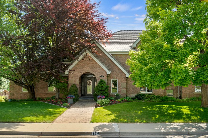 Stunning panoramic valley views await in this architectural masterpiece perched on the Orem hillside. Built with commercial-grade steel beam construction, this extraordinary 4-story estate blends luxury living with unparalleled entertainment. The grand floor plan features high-quality cherry and maple cabinetry, two full kitchens with gas ranges, and a dedicated dual-desk home office. An entertainer's dream, the property boasts a private indoor racquetball court, a tiered theater room, and a spectacular resort-style backyard complete with a cascading waterfall, a large pavilion, a putting green, and a playset-perfect for hosting unforgettable weddings and large gatherings.The top-floor primary sanctuary offers an exclusive private balcony with breathtaking sunset and firework views. Accessibility is effortless across all levels via the private elevator. This estate also includes an integrated, high-income ADU apartment featuring three separate exterior entrances. Do not miss the immersive 3D virtual tour! Square footage figures are provided as a courtesy estimate only and were obtained from county tax records.  Buyer is advised to obtain an independent measurement.