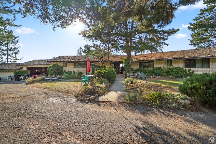 Exquisite 4-Acre Development Opportunity in Prestigious Hidden Ridge. Introducing an unparalleled opportunity to acquire a truly exceptional 4-acre parcel within the highly esteemed Hidden Ridge enclave in Sandy. This distinguished corner lot, prominently situated at the entrance off Dimple Dell Road, has been meticulously held within the same family for five decades, embodying a rare blend of heritage and potential. Envision the limitless possibilities this property affords: construct an opulent estate, undertake a sophisticated remodel, or subdivide into four 1-acre parcels, with the potential for re-zoning to accommodate even smaller lots. Salt Lake County has sanctioned the land for 1-acre divisions, enhancing its versatility. Indulge in the proximity to world-renowned ski resorts such as Alta, Snowbird, Solitude, and Brighton, all within easy reach for winter enthusiasts. Explore nearby majestic trails, including Bell Canyon, Big Cottonwood Canyon, and the Bonneville Shoreline Trail, all offering stunning natural beauty. This prime location also provides convenient access to high-end shopping, gourmet dining, and vibrant entertainment options. Seize this extraordinary chance to secure a premier piece of real estate in one of Utah's most coveted neighborhoods. Arrange a private viewing today and begin crafting your vision for a luxurious lifestyle amidst the scenic splendor of Hidden Ridge. Square footage figures are provided as a courtesy estimate only and were obtained from county record. Buyer is advised to obtain an independent measurement.