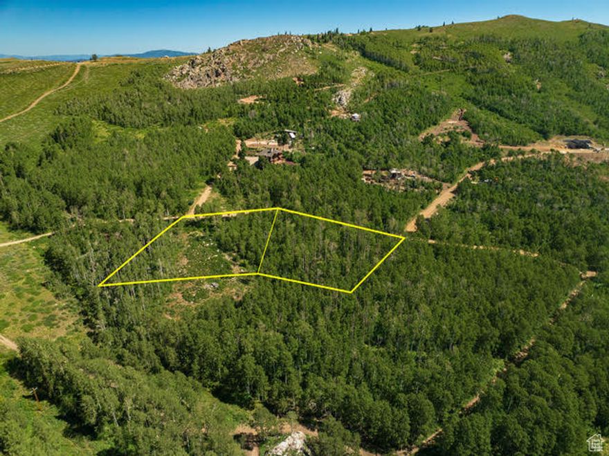 Beautiful Brighton Estates Double Lot just off the back of Empire Pass. 2.45 acres of Thick Aspen Glades. Includes one water share. Power at the corner of the lot. The property has preliminary plans from OTTO WALKER. Close to the Bonanza Flats Open Space and Trails. Excellent views of 3 ski areas and the Heber Valley.