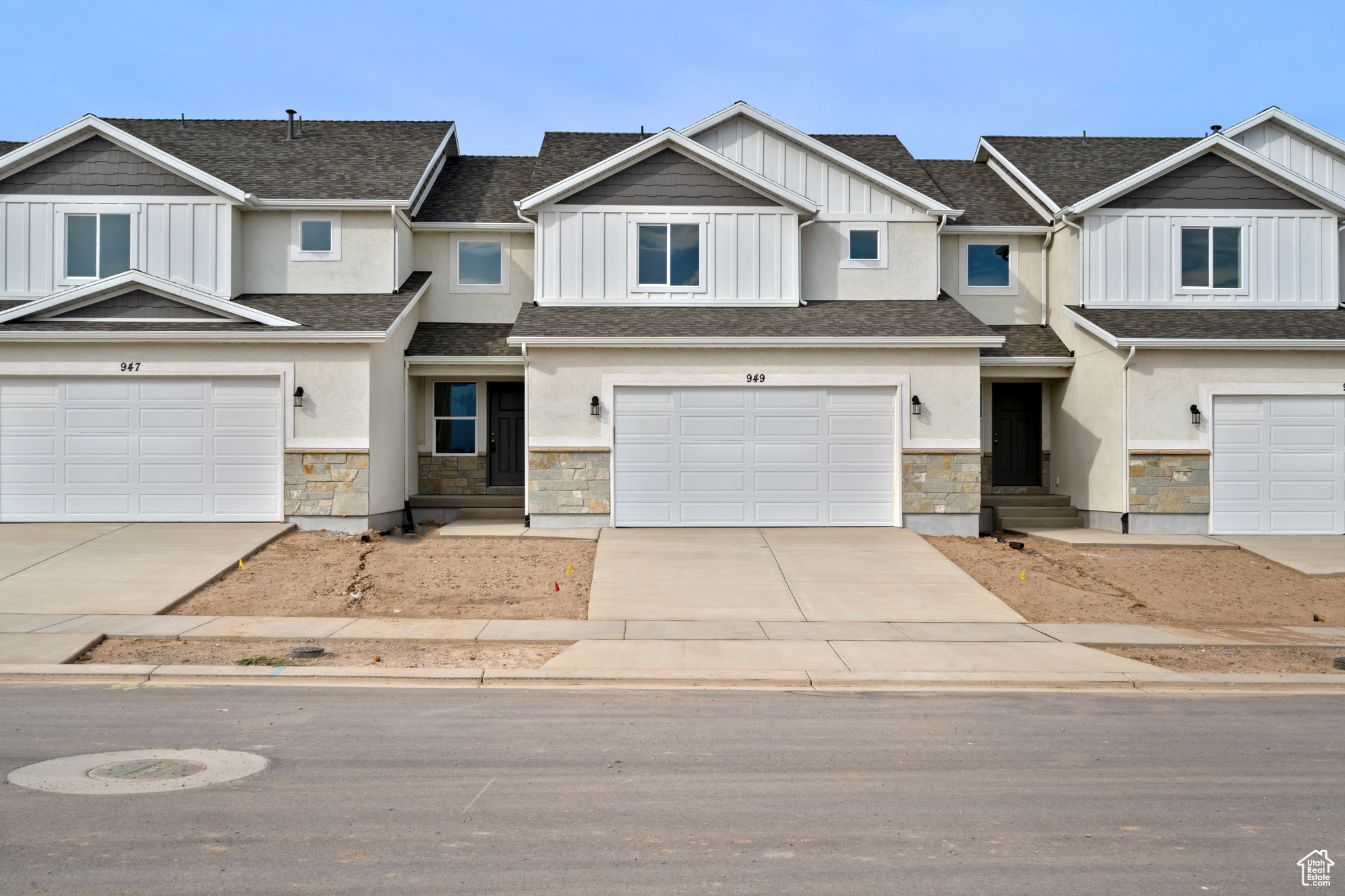 This is NOT your average townhome, you'll love the feel and finish of this HUGE home. Revere Homes has gone all out to provide one of the best values you'll find in Utah County! This beautiful unit features 3 beds/2.5 baths, room to grow in the unfinished basement, upstairs laundry, and a master suite you'll love! Includes upgraded stainless steel appliances, white kitchen cabinets with "Haze Rustic Alder" island and bathroom cabinets, quartz countertops, LVP/LVT and carpet flooring, smart thermostat, and a craftsman-style exterior. Oversized 24'x24' garages are also included, which you won't find anywhere else! Special interest rate of 4.875% for a FIXED 30-year FHA loan!! Only available when using Seller's preferred lender, not all buyers will qualify. Units are now complete and ready to occupy, Supra keybox access.