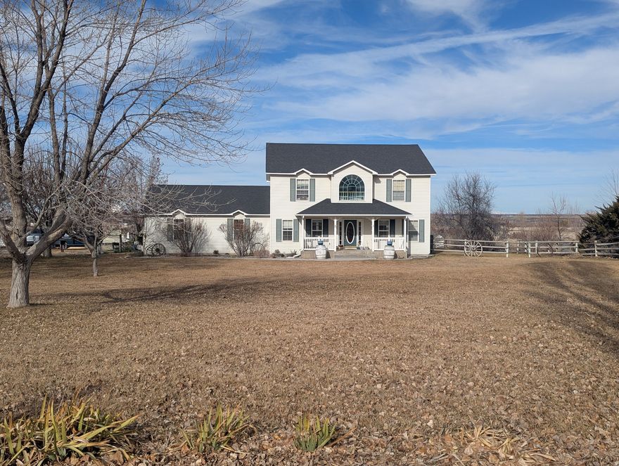 A super cute country home with a 2 car attached garage and wonderful views of the Snake River Canyon Rim and the North Mountains. Great floor plan with decorative touches, some newer updates and a brand new roof in 2022. HVAC replaced in 2018. Newer pellet stove in the family room to keep you warm on those colder nights. Fenced in pasture to bring your big animals for you to enjoy. Plenty of room for a growing family, pets and RV's. Enjoy the mature landscaping and trees during the summer. Located down a private lane just north of Falls Ave. E.