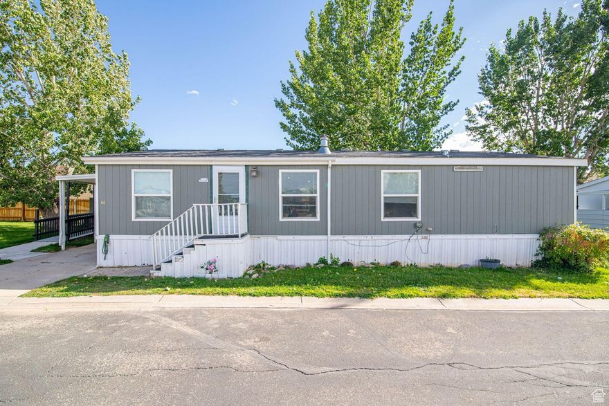 Welcome to Canyon View Manufactored Home Park. This charming and affordable home is situated on a rented lot in Cedar City. This residence offers 4 bedrooms and 2 bathrooms with a comfortable, open floor plan designed for easy living. The kitchen features ample counter space, cabinetry, and a designated dining area, while the spacious living room is filled with natural light. The primary suite includes a private bathroom and generous closet space for added convenience. Outside, enjoy a fenced yard with room for gardening or relaxing, plus a storage shed for your extras. Conveniently located near shopping, schools, and parks, this home is move-in ready, with new roof and furnace! Park rent includes: lot rent, water, sewer, trash and common area maintenance.