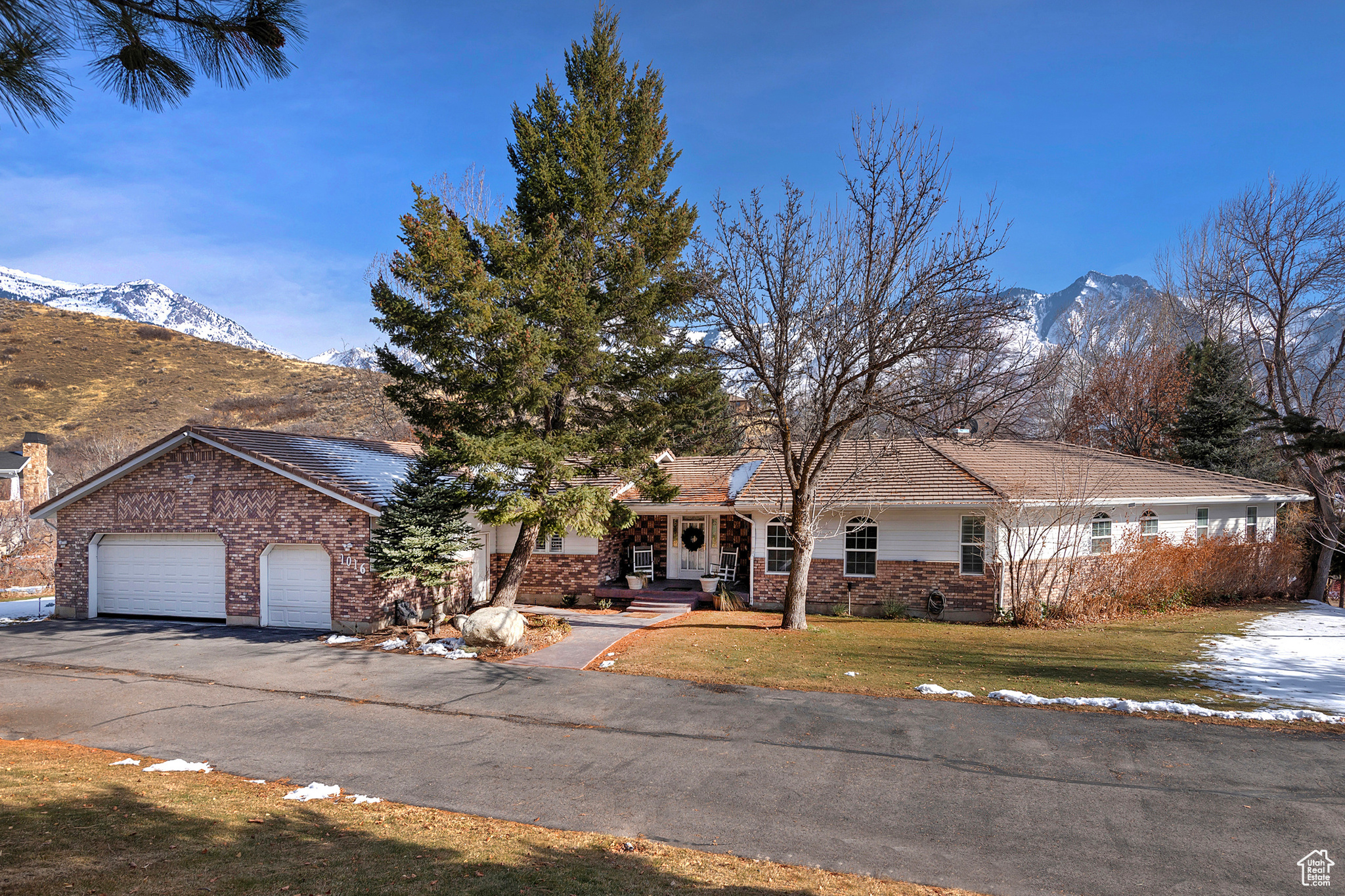 Rare opportunity to own a stunning 5-acre property on Fort Canyon Road in Alpine, Utah! This unique offering includes four separate parcels featuring two homes. The main residence boasts an expansive 7,000 square feet with six bedrooms, four bathrooms, and a spacious three-car garage complete with a workspace. The second home is a teardown, providing a blank canvas for your vision. Enjoy breathtaking mountain views, exceptional privacy, and a serene river that runs through the property. Don't miss out on this incredible chance-call today for more information!