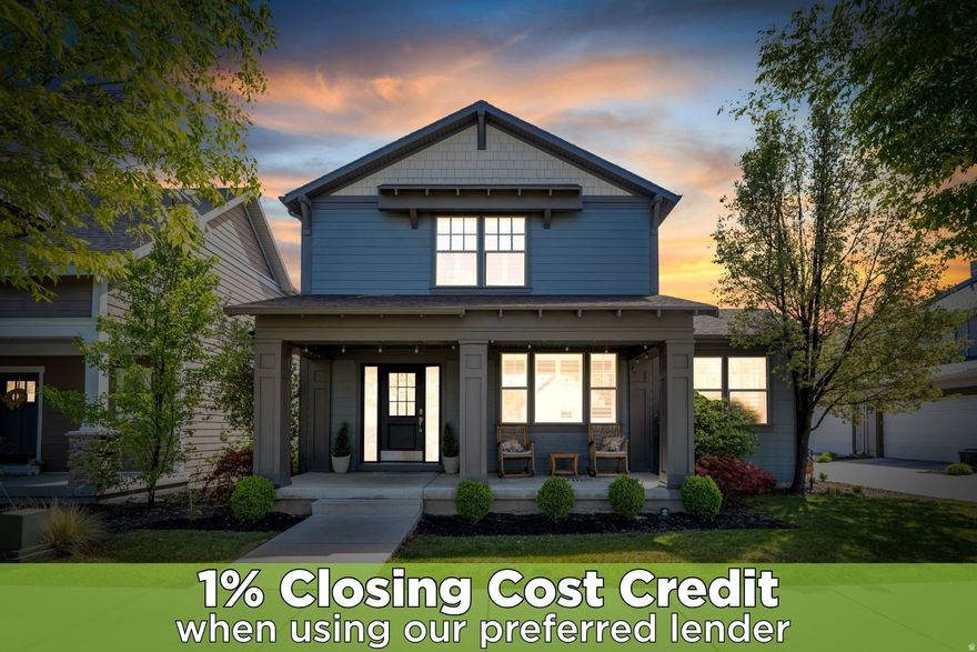 Welcome to this stunning two-story home in the heart of Daybreak, where thoughtful design and high-end finishes come together beautifully. With fully paid-off solar panels, this home offers both style and energy efficiency.  Step inside to a spacious and functional layout, highlighted by a massive mudroom complete with custom built-ins for coats, shoes, and backpacks, perfect for keeping everything organized. The kitchen is truly a showstopper, featuring a dramatic waterfall quartz countertop, matching quartz backsplash, beautiful cabinetry, a gas cooktop, and a built-in double oven, ideal for both everyday living and entertaining.  The living room is warm and inviting with a striking accent wall, built-in fireplace, and plantation shutters that add both charm and sophistication throughout the home.  Upstairs, the primary suite offers a luxurious retreat with a large walk-in closet complete with ample shelving and drawers. The ensuite bathroom features a relaxing soaker tub and a euro shower with digital temperature controls and a rain shower head for a spa-like experience.  Enjoy outdoor living with a welcoming covered front porch and a backyard designed for entertaining and gathering.  This home combines modern upgrades, functional spaces, and timeless style, all in the vibrant Daybreak community.