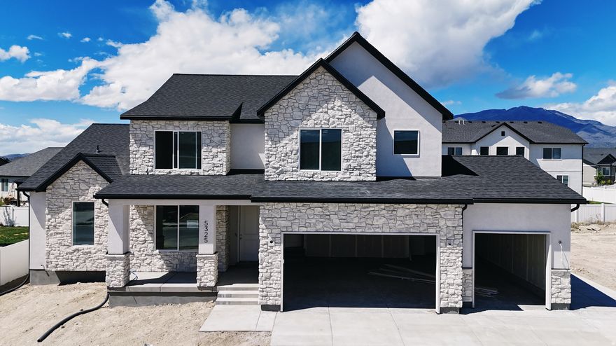 The Kaitlyn floor plan in the final phase of Sage Park. Over 5,200 sq ft two-story home featuring a main-floor primary suite, dramatic two-story great room, and an exceptional primary bath and closet. Basement entrance offers future ADU or multi-generational living potential, plus fireplace and expansive family space. Traditional styling throughout appeals to the discerning buyer. Completion end of May. Call for your personal showing and details on finishes and selections.