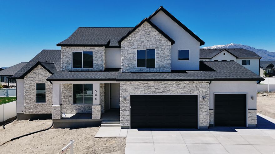 The Kaitlyn floor plan in the final phase of Sage Park. Over 5,200 sq ft two-story home featuring a main-floor primary suite, dramatic two-story great room, and an exceptional primary bath and closet. Basement entrance offers future ADU or multi-generational living potential, plus fireplace and expansive family space. Traditional styling throughout appeals to the discerning buyer. Completion end of May. Call for your personal showing and details on finishes and selections.