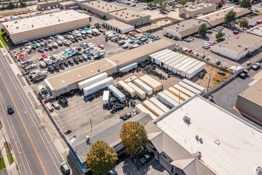 Unlock the future of South Salt Lake in a federally designated Qualified Opportunity Zone (QOZ). Prime TOD-zoned site with shovel-ready momentum: MEP, site/civil, and architectural plans ~90% complete (plans available; terms negotiable). Flexible zoning supports mixed-use, commercial, or continued industrial uses. Clean environmental report, 3,512 SF office/warehouse with 14' doors, and a flat, fully fenced 1.1-acre rectangular lot.