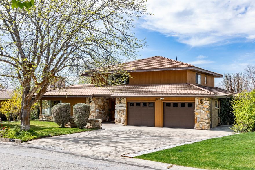 Come see this incredibly loved lower Olympus Cove 2 story. Loads of family memories have been made by the amazing owners over the past 61 years!! A big remodel and addition in 1984, a secret 3 story laundry chute, game nights, family and friend gatherings, Christmas decorations by the front windows, and hot tubbing year round in a private back yard are some special ones! Need a gigantic primary suite with tons of closet space and beautiful Mt. Olympus and valley views? What about amazing I 215 access on a quiet circle? How about a garage so clean you could picnic on the floor? Need a MONSTER storage room for a workshop, home gym, theater, or craft room? This home has been meticulously cared for and is ready for your updates. 3 furnaces and A/C units, hot tub is older but works great! Massive electrical upgrade. 3 gas fireplaces. Refrigerator is excluded. Alarm system works but is not currently monitored. Come be the next incredible owner of this sweet home and make your own beautiful memories