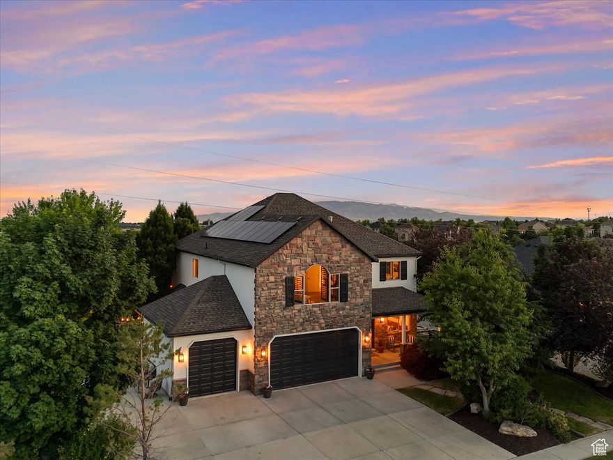 Welcome to this Stunning 7 Bedroom 4.5 Bath Remodel in Highland! Featuring Beautiful Formal Living Room, & Spacious Great Room. The Gourmet Kitchen is a Chefs Dream and Entertainers Delight, boasting  Breathtaking Taj Mahal Quartzite Counters, Herringbone Tile Back Splash, Beautiful LVP Flooring, Soft close Cabinets, Stainless Appliances and more, truly make this Kitchen the Jewel of the home!.  Retreat to the Elegant Owner's Suite, an opulent sanctuary perfect for that King or Queen. The luxurious Master Bath Boasts Stunning Quartz Counters, New Cabinets, Striking Lighting & Fixtures, and invites you to pamper yourself in the jetted tub.. the Gorgous Wallpaper & Beautifully Tiled Shower, to be completed with Euro Glass Finish!  Additional features include a Private Bedroom with En Suite, a Den option, Serene Mediation room, & Exercise room, all designed to cater to your lifestyle! Two other upstairs Bedrooms are separated by an Updated Jack & Jill Bath, with separate Tub/Shower, etc  Downstairs another large family/game room awaits you! Experience Cinematic Magic in the Theater Room, with built-in speakers on all 4 walls and ceiling, along with 2 oversized subwoofers for an unparalleled sound and video experience!  Also enjoy all your snacks and keep your drinks cold in the mini fridge! The Expansive yard, extending beyond the .39 acres to the walking path, will be a cherished playground, where countless memories could be made. Enjoy evenings unwinding in the hot tub or hosting gatherings around the fire pit or beautiful patios, while enjoying the Amazing Mountain Views! The kids will have hours of fun with the in-ground trampoline and playground, while that green thumb in your family will enjoy the grow boxes and variety of fruit trees. The oversized 3 car garage offers ample space for all your rides and toys along with convenient storage and bike racks. Generous RV parking is also available!  Don't miss the opportunity to call this Elegant Remodel your own.. A true Masterpiece of Luxury Living!