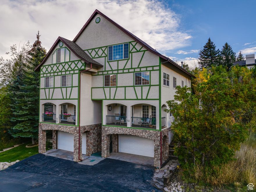 ***OPEN HOUSE: Thursday, October 7 from 5-7pm*** Use 952 Zermatt drive to get to the unit) Welcome to your alpine retreat in the heart of Midway. This Swiss inspired townhome blends mountain charm with modern comfort and space for everyone. Designed for gathering, it features multiple bedrooms and bathrooms, two spacious family rooms, and a loft perfect for play. An in home elevator adds convenience, while two decks, one overlooking the valley and another tucked under the trees, offer both sweeping views and private escapes. Furniture is included. Most decor is excluded.  The community is filled with amenities including pickleball and tennis courts, a sauna, hot tub, racquetball court, gym, playground, and game room. Whether you are entertaining, relaxing, or exploring all that Midway has to offer, this home is the perfect year round getaway. WATCH HOUSE TOUR HERE: https://www.youtube.com/watch?v=ySPG9BcujM4