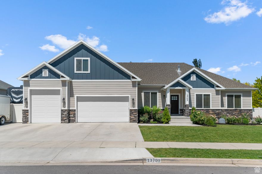 PRICE REDUCED! Beautiful Herriman Home with NO HOA! Custom build upgrades include wood grade cabinets with soft-close, granite countertops, recessed lighting and ceiling fans throughout. SS Frigidaire Professional appliance package. Under cabinet lighting and outlets. Master with ensuite includes freestanding tub with tile surround, dual vanity, and WIC.  1,000+ sq ft 4 car garage is fully insulated, has epoxy floors, painted walls  and man door to backyard. Large 0.45 acre flat lot with great shape for full use of the lot size. Fully fenced and landscaped. Mature trees as well as privacy trees planted around the back corner around the pond. Tons of RV Parking, 30 amp RV receptacle installed for RV. Covered patio. Fully finished basement with 9' ceiling height and basement walk out. 2 car garage floor is a suspended slab, room below the 2 car is finished as a 400+ sq ft storage room. Basement is stubbed for future kitchen, all electrical and plumbing installed and available. Square footage figures are provided as a courtesy estimate only and were obtained from tax data. Owner/Agent